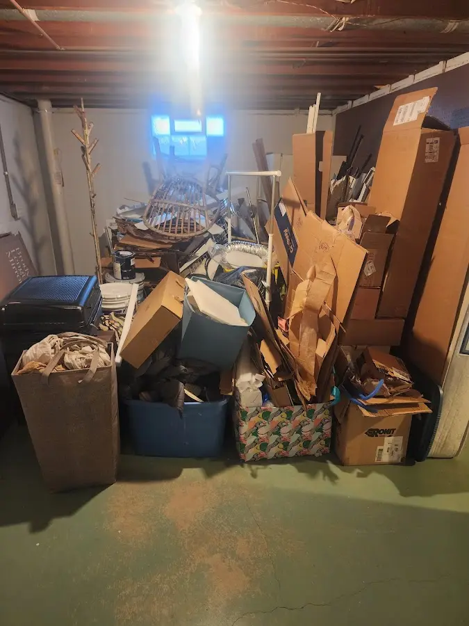 Roll-off dumpster container at job site for Construction Dumpster Rental in Clinton